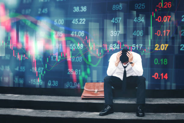 "Devastated trader watching stock chart crash"
